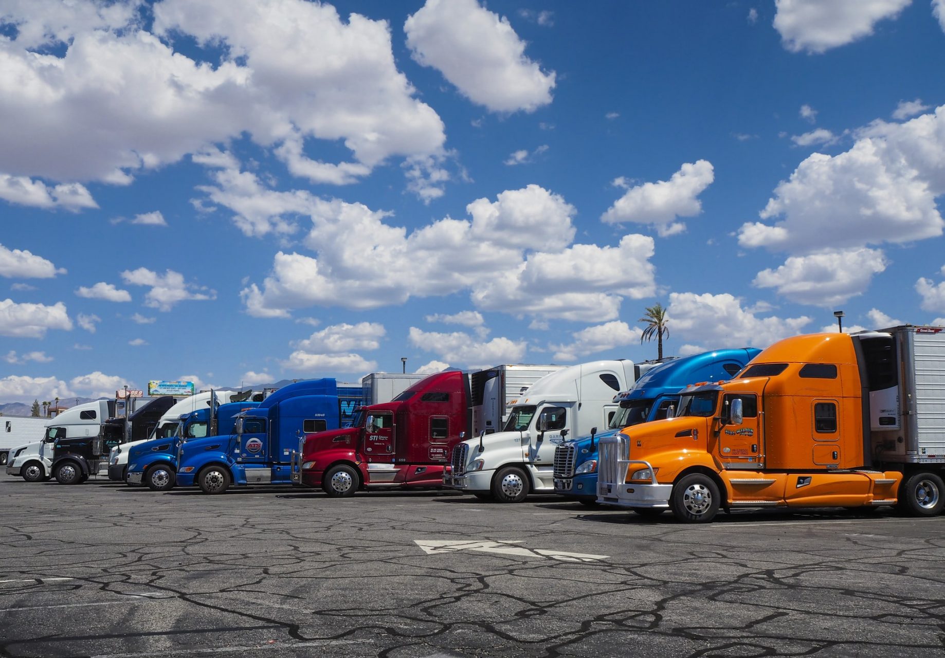 Lineup of multi colored trucks